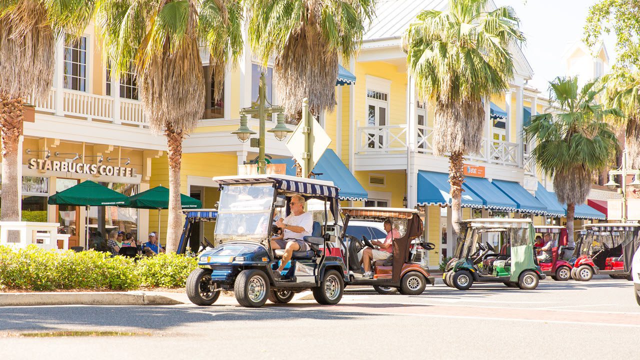 about-us-community-development-cdd-orientation-lake-sumter-starbucks-golf-car